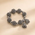 Silver Cluster Bead Bracelet with Hanging Jhumka Charms