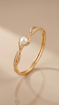The Infinity Pearl Wave Bangle – Anti-Tarnish Gold Pearl & Pavé Bracelet