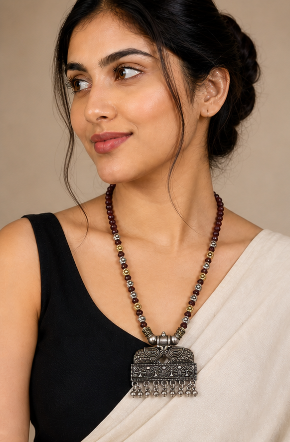Oxidized Dual-Tone Maroon Crystal Bead Necklace with Tribal Peacock Pendant