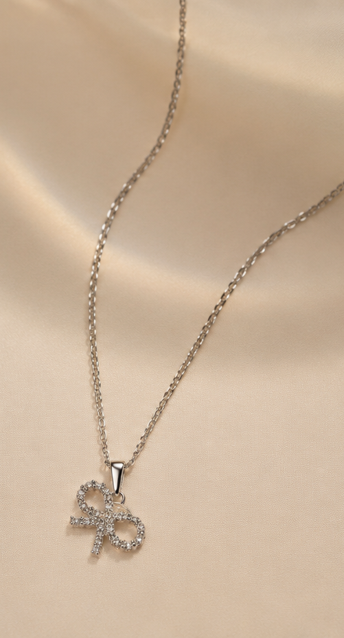 The Tied-In-Love Ribbon Charm – Waterproof & Anti-Tarnish Silver Pendant