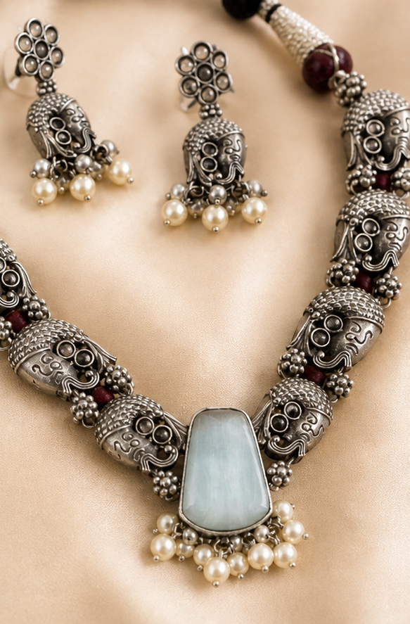 Silver Replica Elephant Motif Necklace with Sea-Green Stone & Matching Jhumkas Set