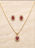 Gold-Plated Oval Ruby & American Diamond Halo Pendant Necklace Set with Stud Earrings