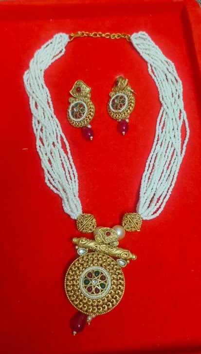 Muktamalini | Antique Gold Multi-Strand Pearl Mala & Kemp Sunburst Medallion Set
