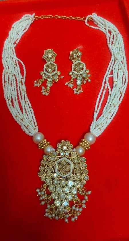 Muktadhara | Antique Gold Multi-Strand Seed Pearl Mala & Kundan Shield Pendant Set